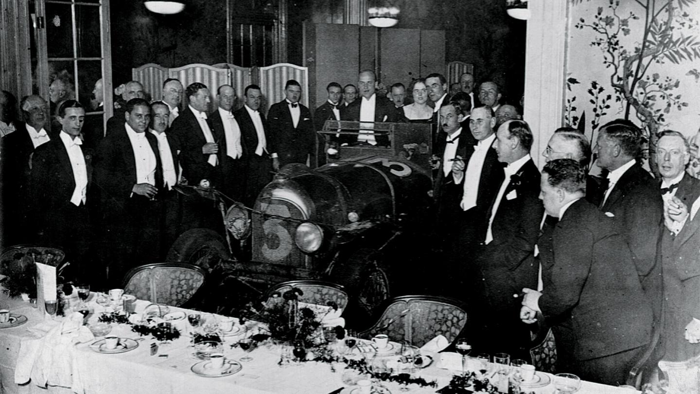 Victory dinner at the Savoy in London where the race winning Bentley is presented in the centre of the dinning room for all attendees to marvel at