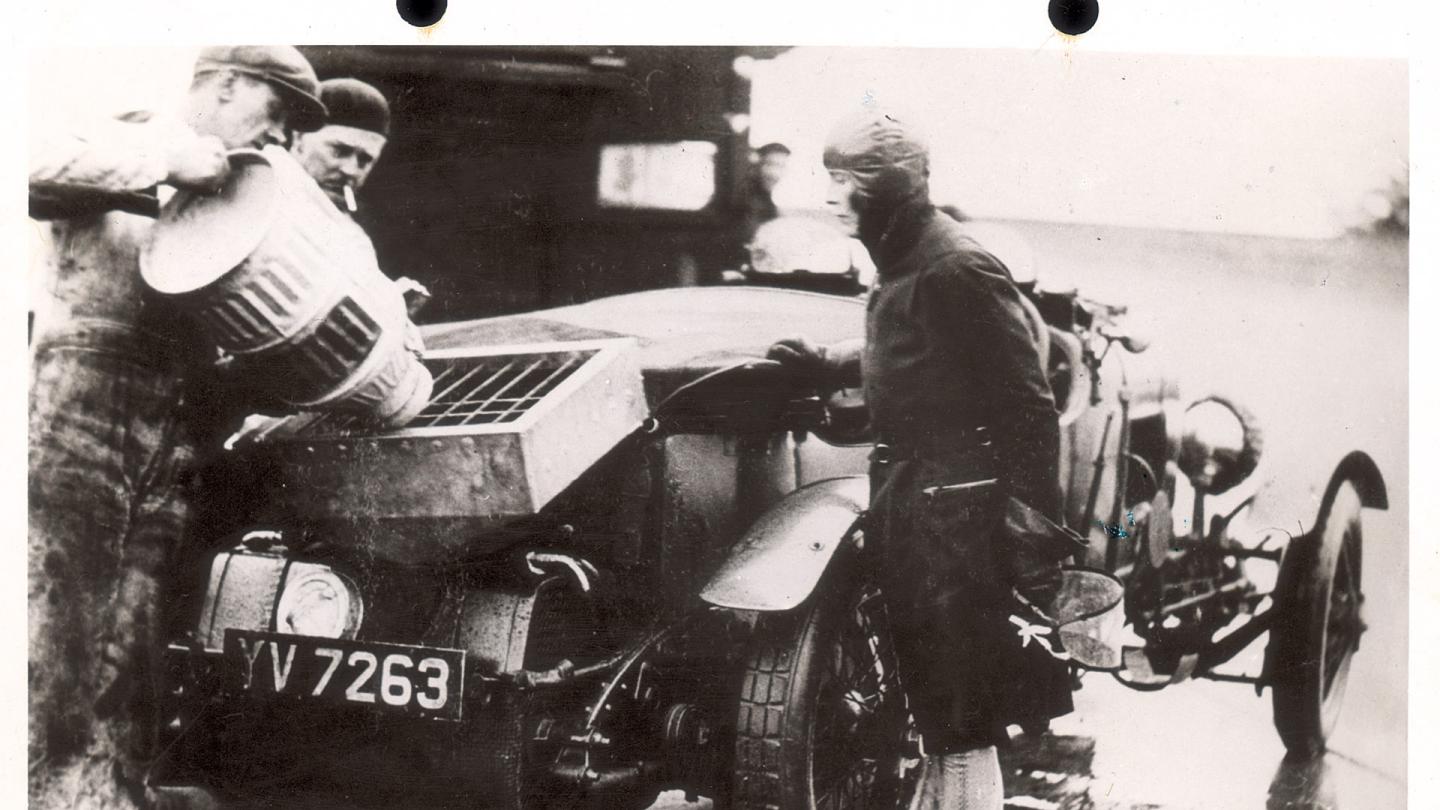 Mildred Mary Bruce expecting the handywork of her pit crew as they refuel her Bentley during her record breaking 24 hour run