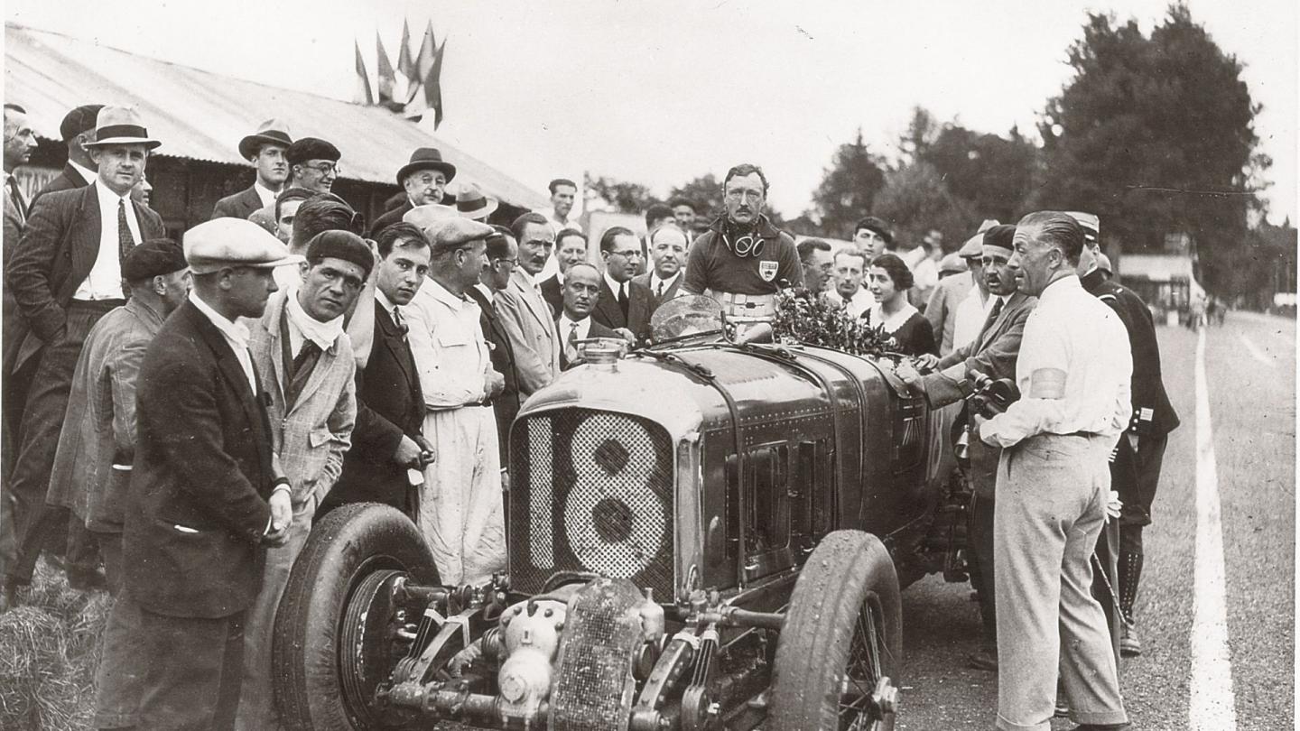 Tim Birkin looking exhausted after his second place performance during the 1930 French Grand Prix