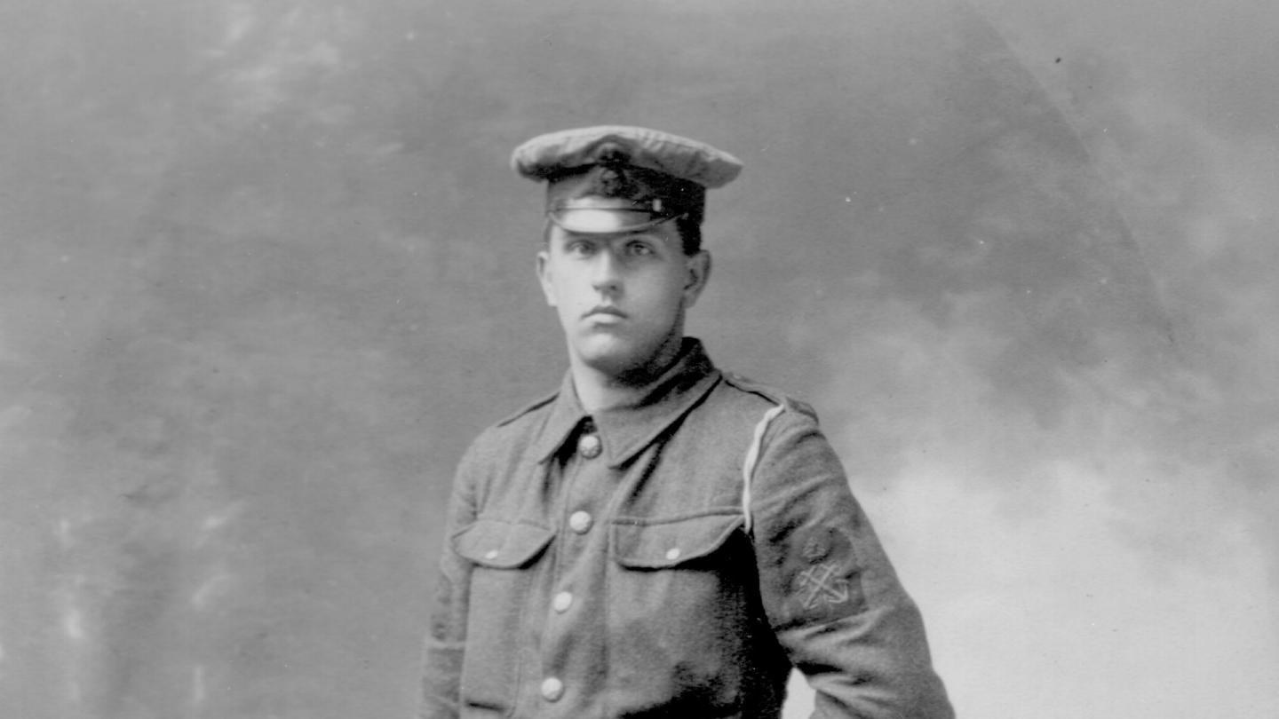 A portrait of Nobby Clarke in military uniform during WW1