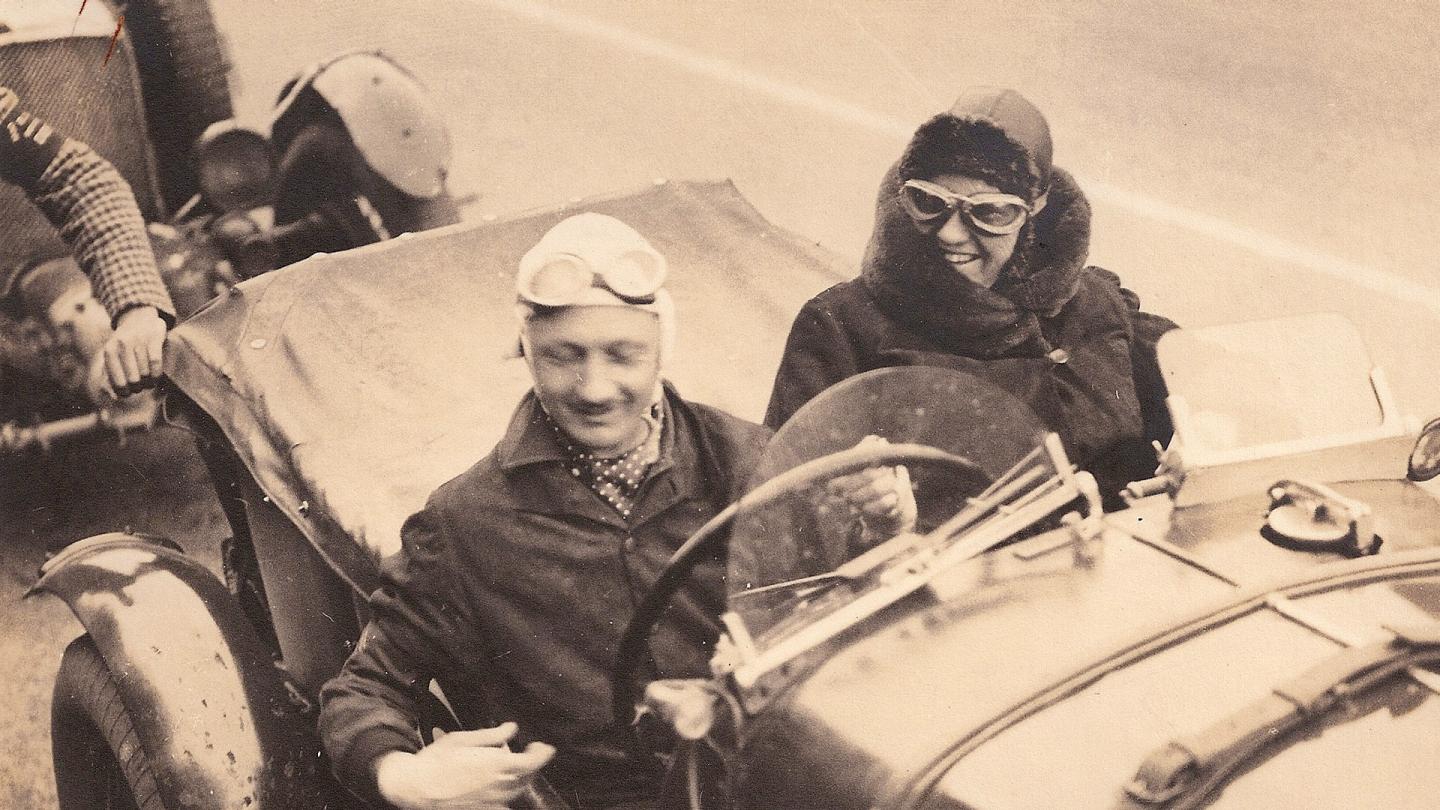Dorothy Paget sat smiling alongside Tim Birkin in their creation the Bentley Blower