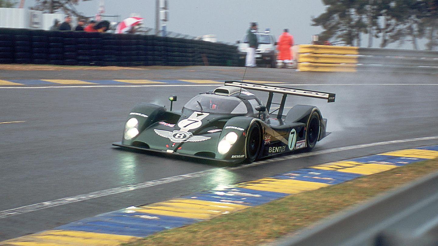 Bentley EXP Speed 8 racing in wet conditions at Le Mans
