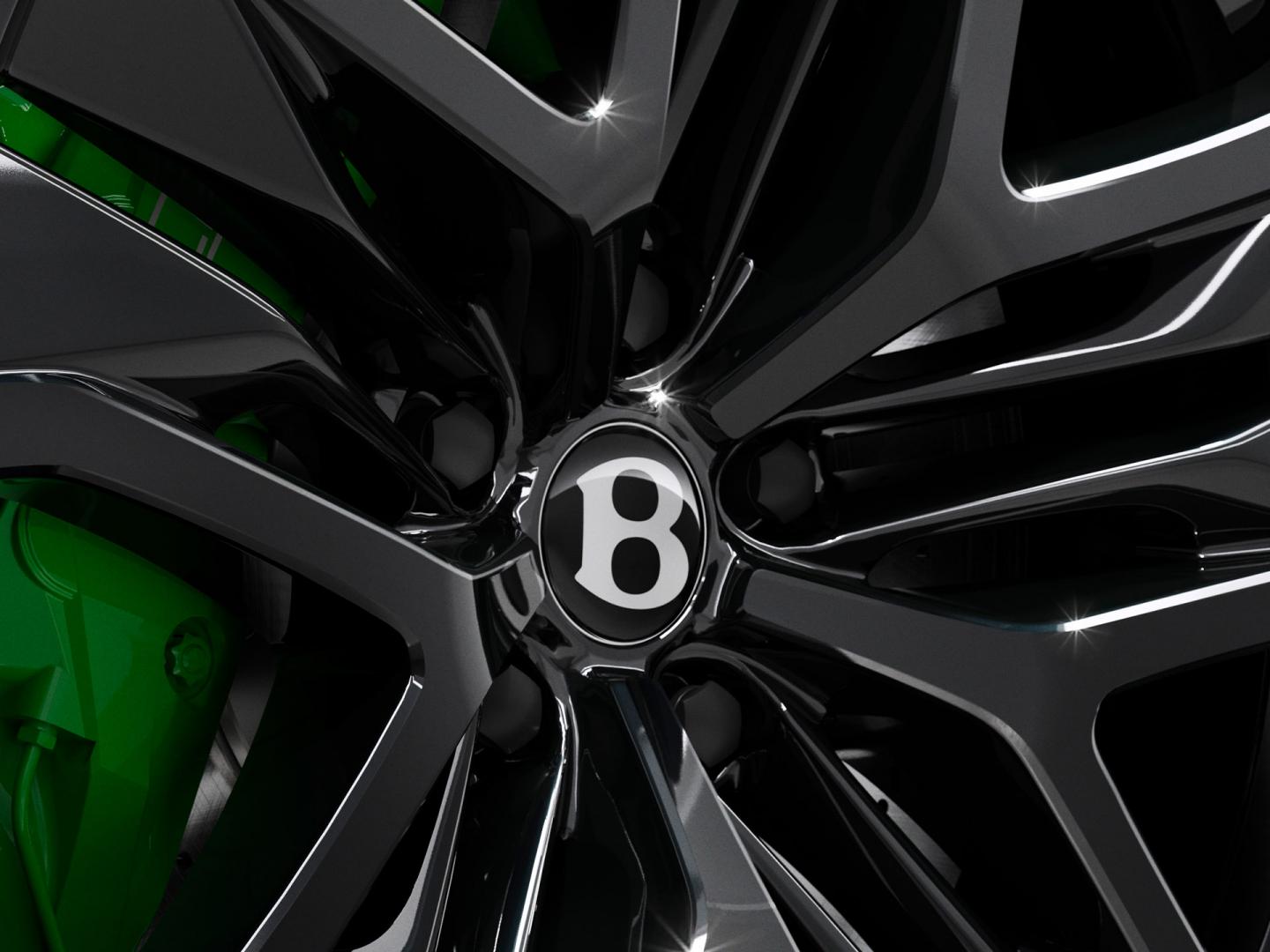 The new 23" Directional Wheels in the Black Painted option with the Hyper Green calliper by Mulliner.