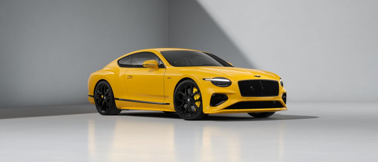 Front three quarters of the Bentley Continental GT Speed in Monaco Yellow.