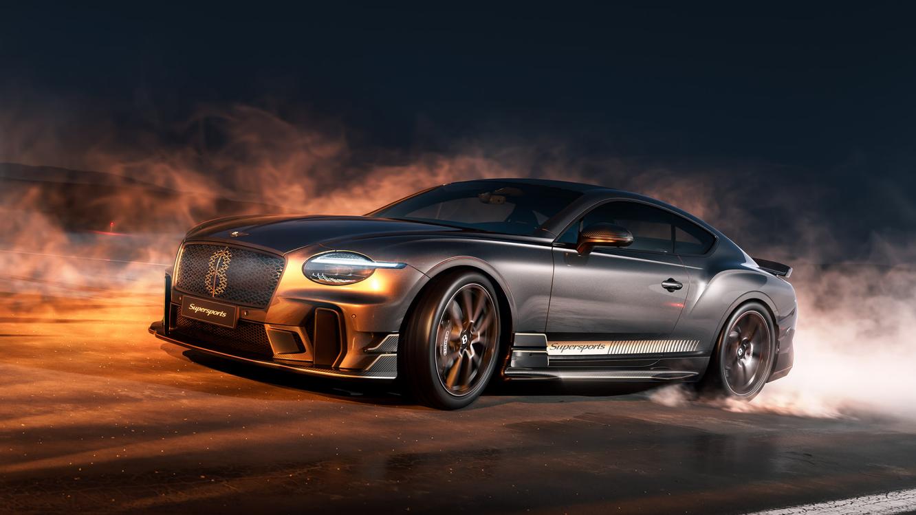 Front three quarter of a Bentley Supersports in Antracite Satin with gold accents driving dynamically on a runway