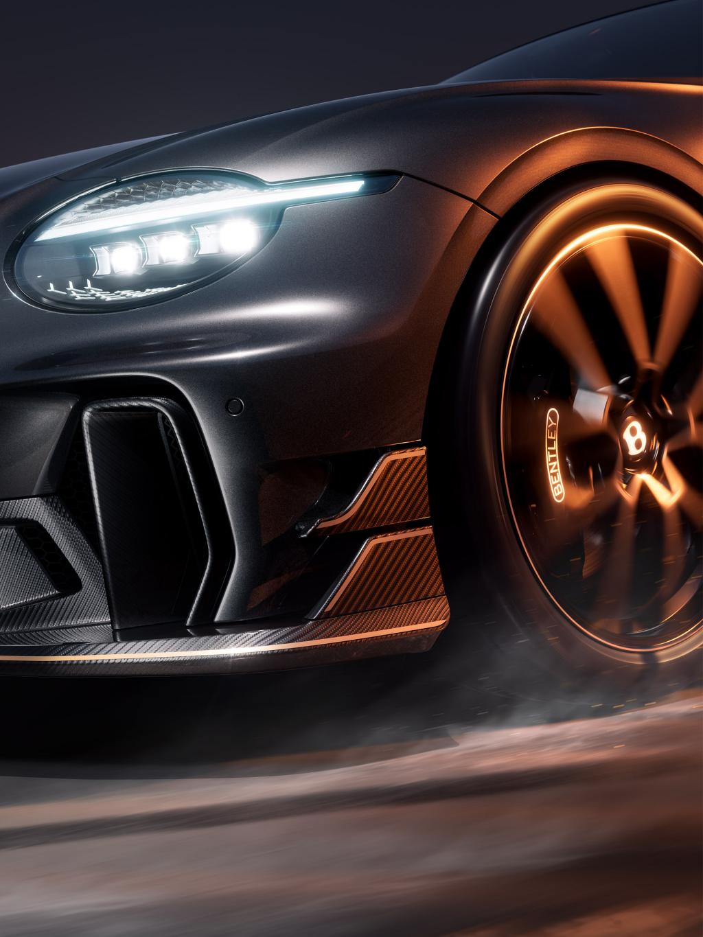 Close up of the front dive planes, headlight and exclusive wheel available on Bentley Supersports