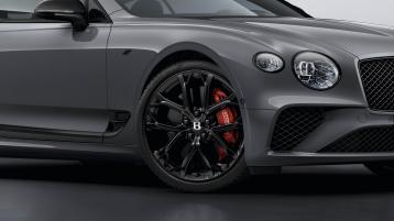 Side view of Bentley Continental GT S in Cambrian Grey colour featuring 22 inch Ten Spoke Sports Wheels - Black Painted and Bentley branded Red brake callipers