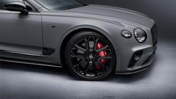Side view of Bentley Continental GT S in Cambrian Grey colour with S fender badge, featuring 22 inch Ten Spoke Sports Wheels - Black Painted and Bentley branded Red brake callipers