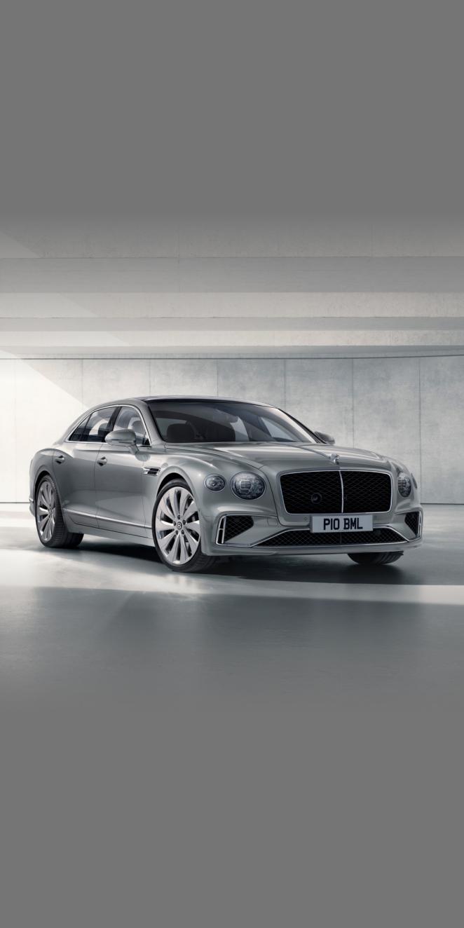 Front side angled view of Bentley Flying Spur in Silver colour, featuring 20 inch Five Twin - Spoke Wheel - Painted.