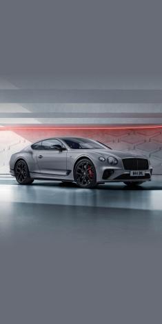 Front side angled view of Bentley Continental GT S V8 in Cambrian Grey colour, featuring 22 inch Ten Spoke Sports Wheel - Black Painted and Ceramic brakes with red callipers.
