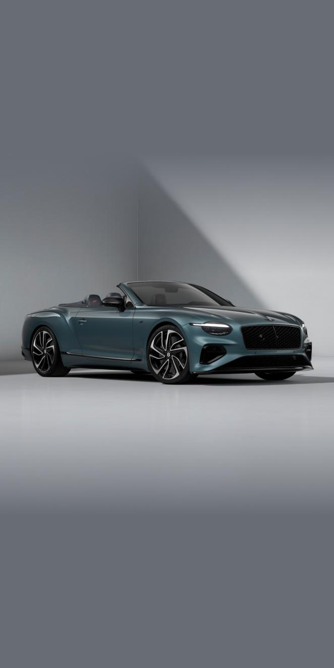 Front side angled view of Bentley Continental GTC S in Thunder Grey colour, featuring 22 inch Five Spoke Sports Wheel