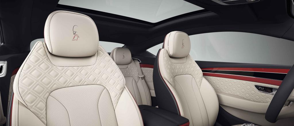 Bentley Continental GT Mulliner in 4 seat configuration featuring custom emblem on headrest with Linen Hide and Diamond quilt pattern on seats. 