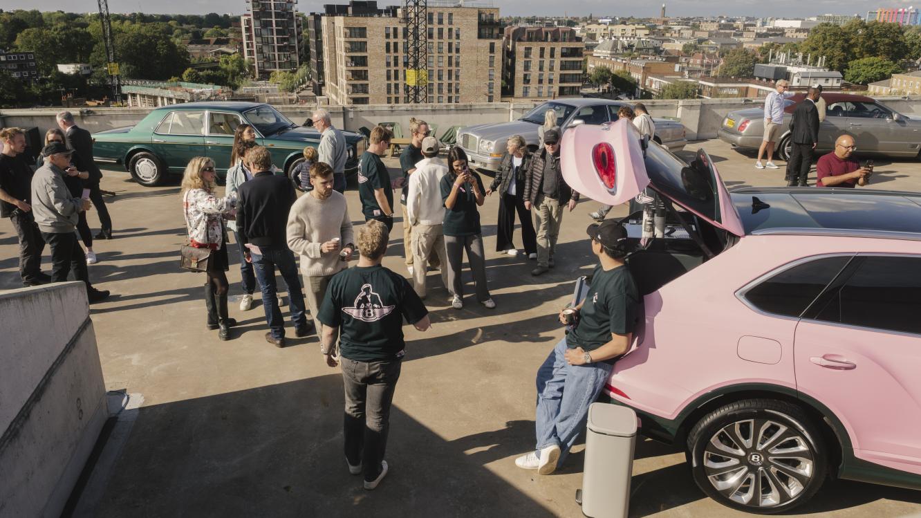 Imagery_Joe and the Juice x Bentley launch event - Bentayga and guests on rooftop 16x9.jpg