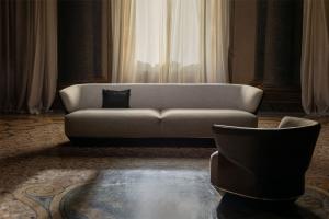 Bentley Home 2026 Collection furniture in a backlit room.
