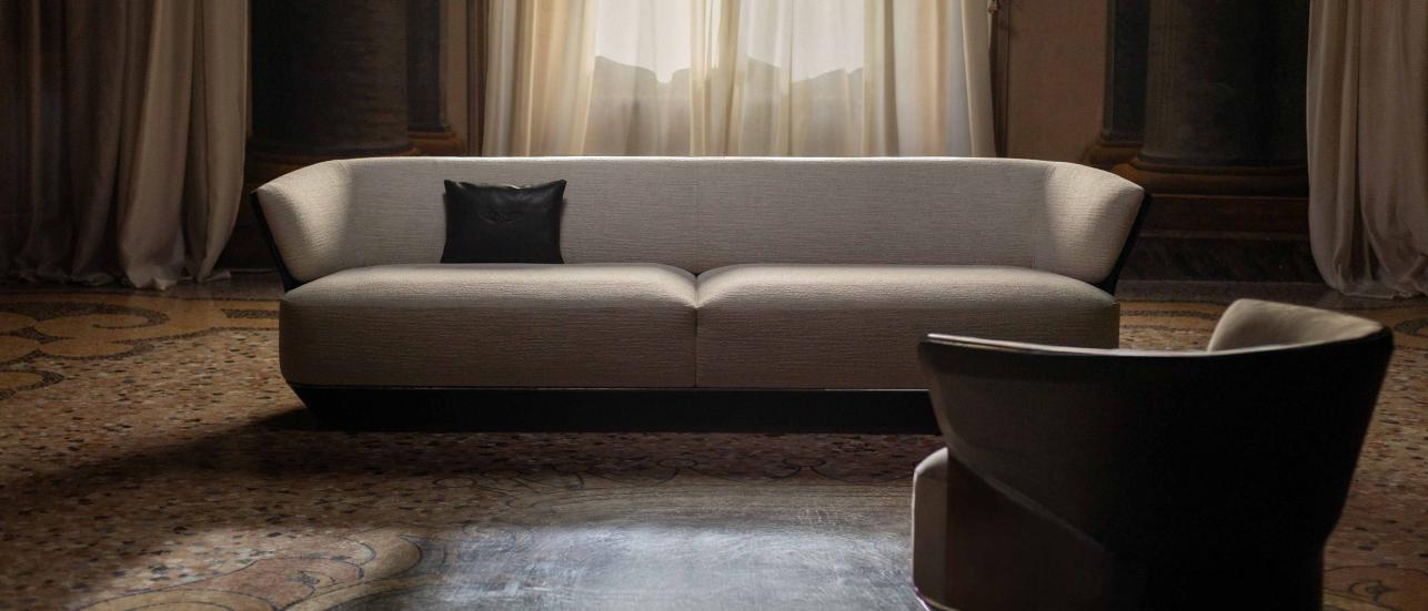 Bentley Home 2026 Collection furniture in a backlit room.