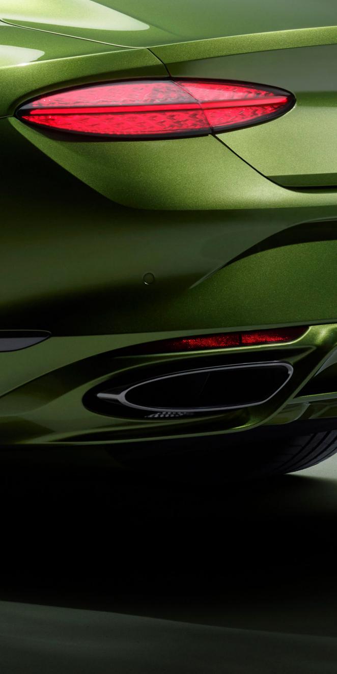 Close up of the exhaust of the new Bentley Continental GT Speed in Tourmaline Green