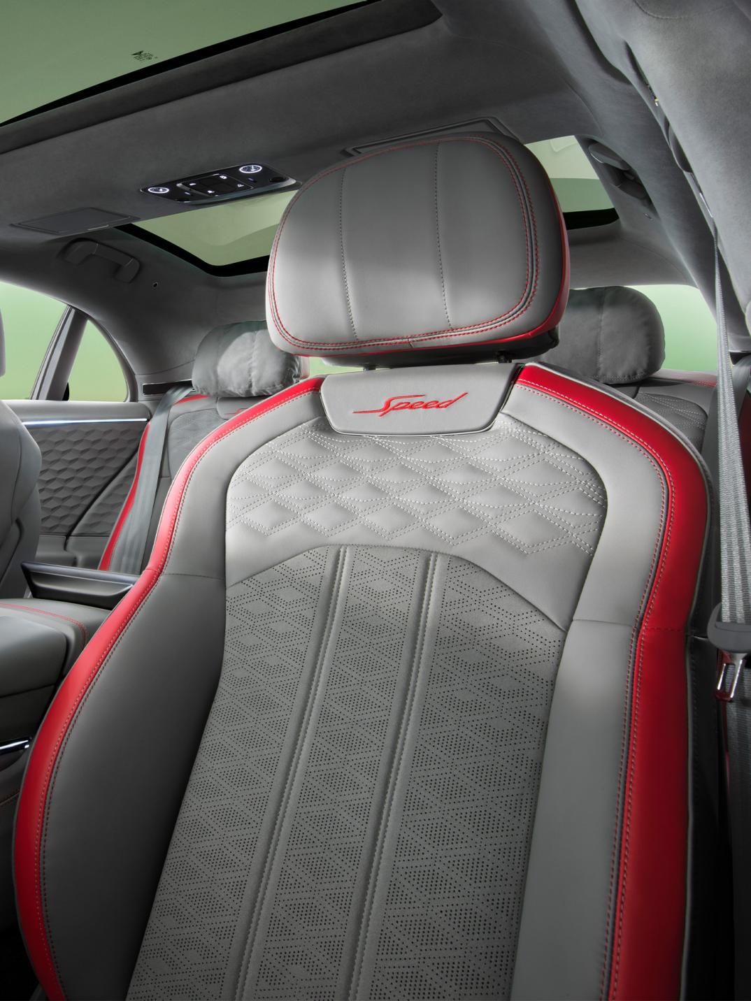Close up of the new Bentley Flying Spur Speed front drivers seat with a Speed coulour speed of dragon red main hide and gravity grey secondary hide
