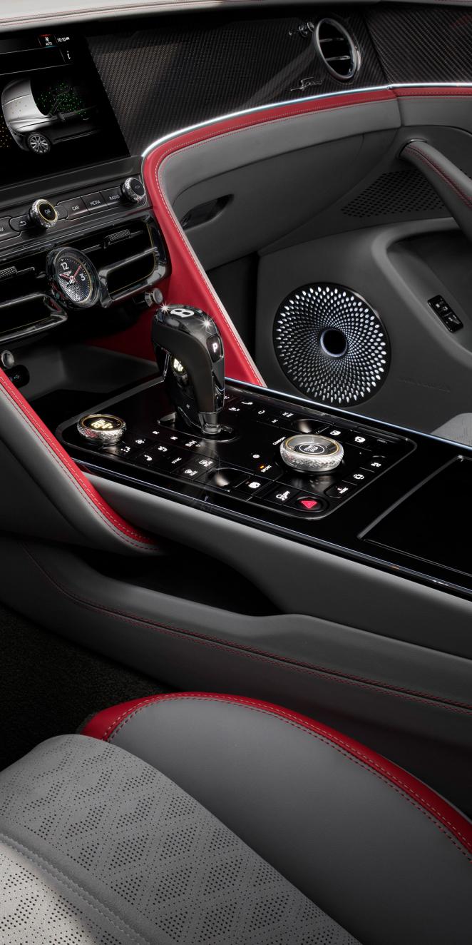 Close up of the driver controls and gear lever in the new Bentley Flying Spur Speed