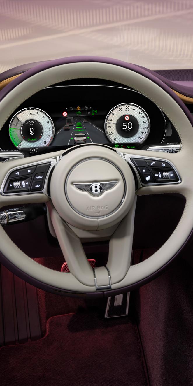 Close of heated and duo tone Bentley Continental GT Mulliner with Linen main hide and Damson secondary hide