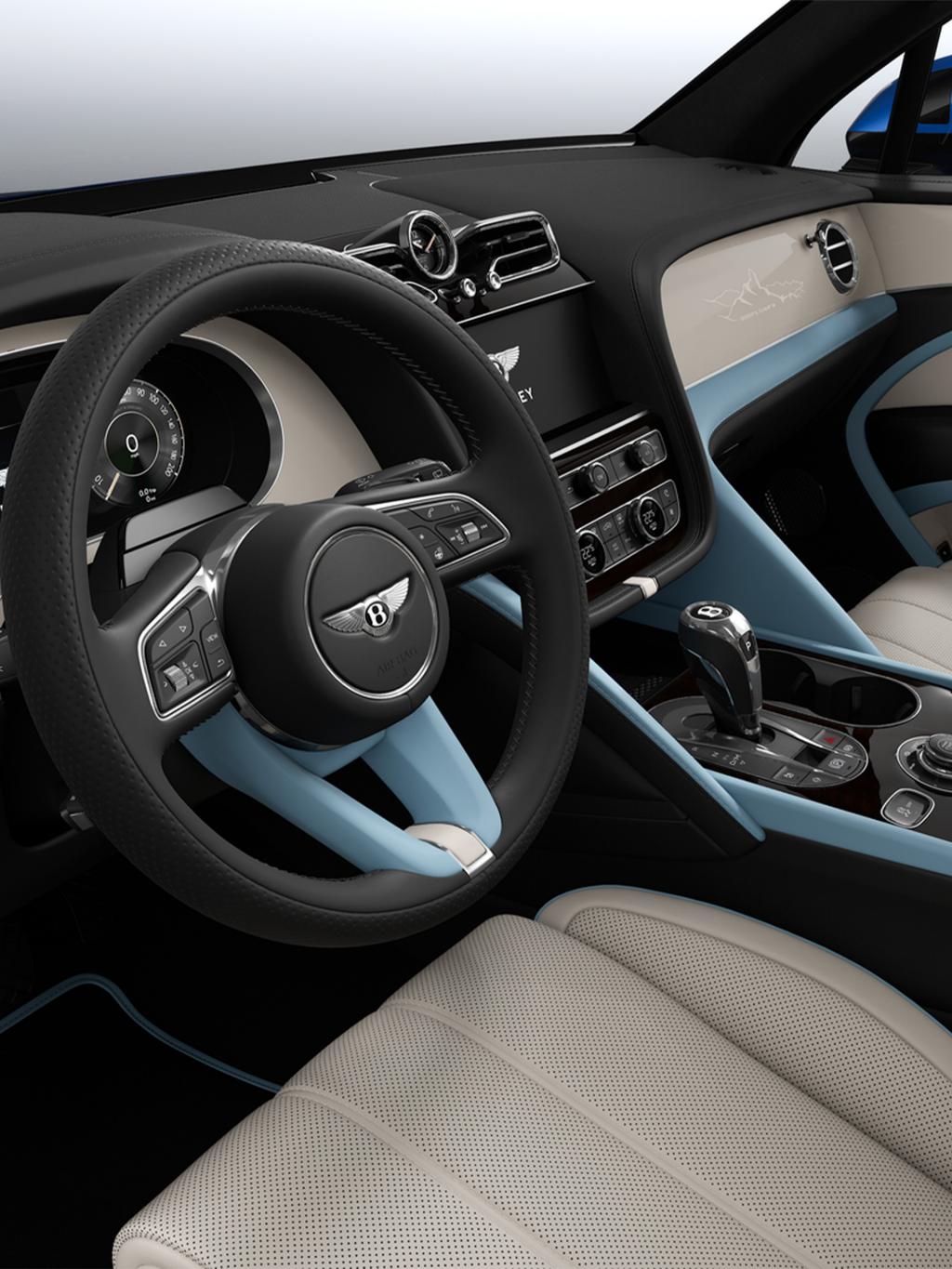 Bentley Bentayga Artenara Edition SUV steering wheel view in Linen and Beluga Black hides with Light Blue accents and Piano Linen veneer