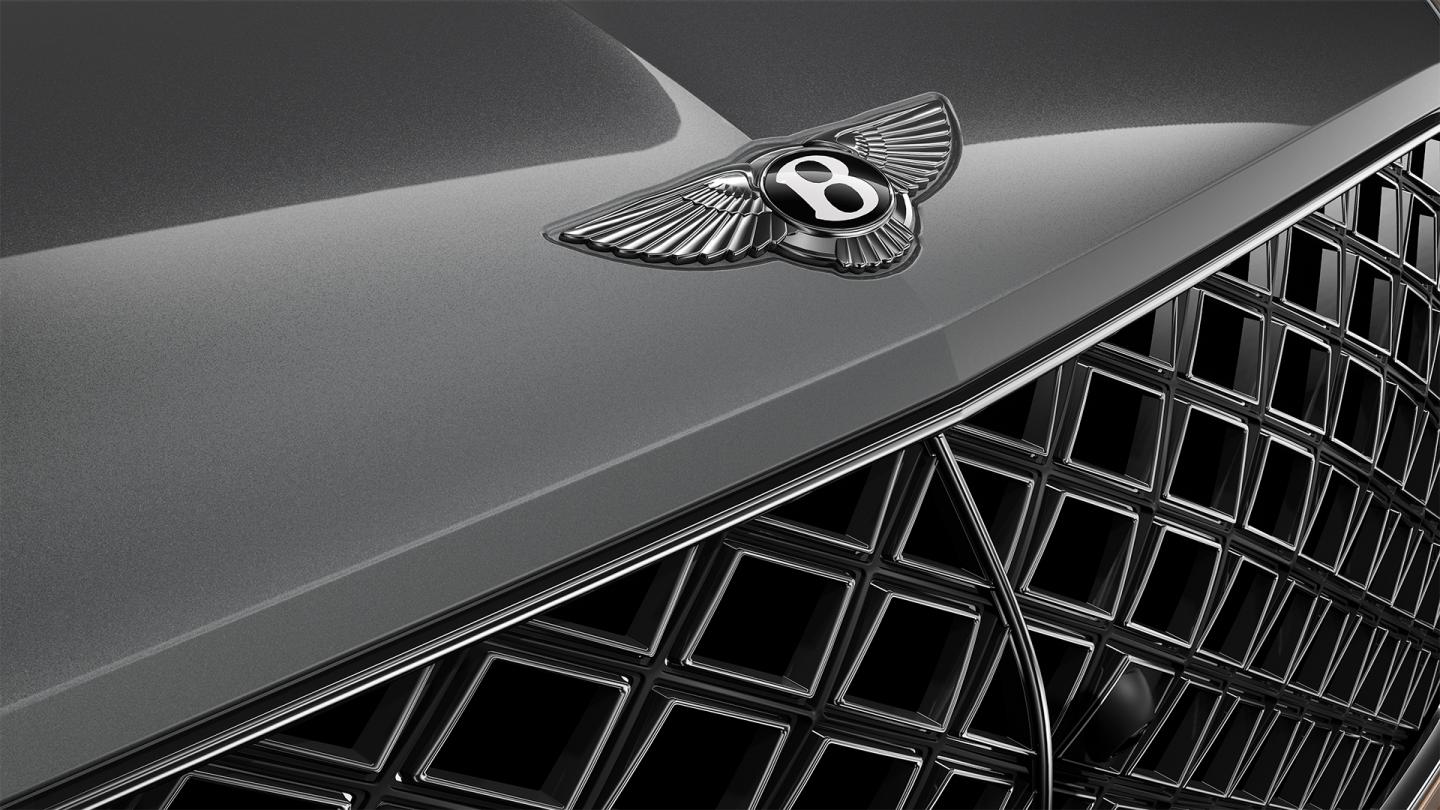 Close up of the Bentley wings on a Bentley Bentayga EWB Mulliner