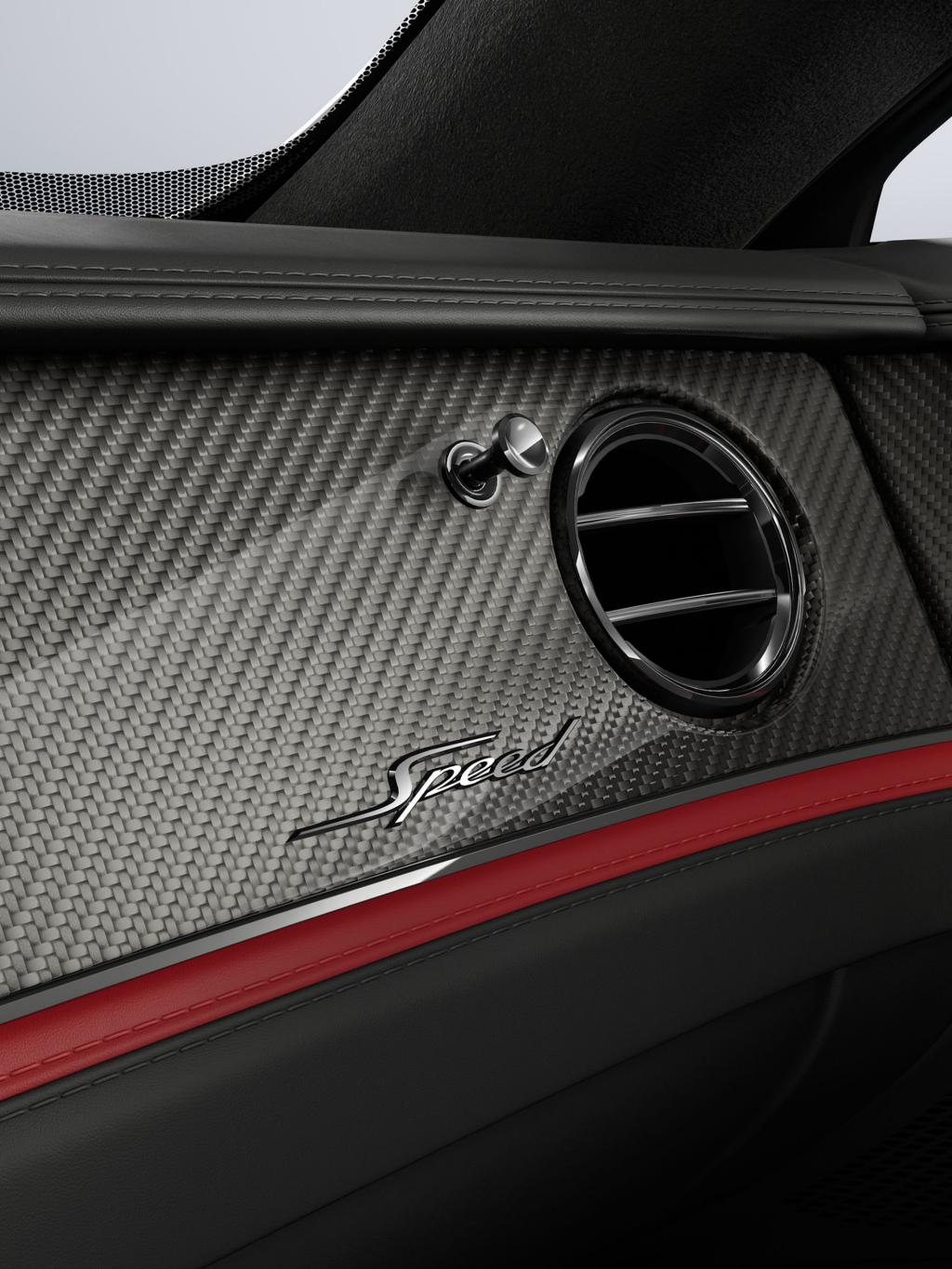 Close-up of the High Gloss Carbon Fibre veneer and air conditioning vent inside the Bentley Flying Spur Speed.