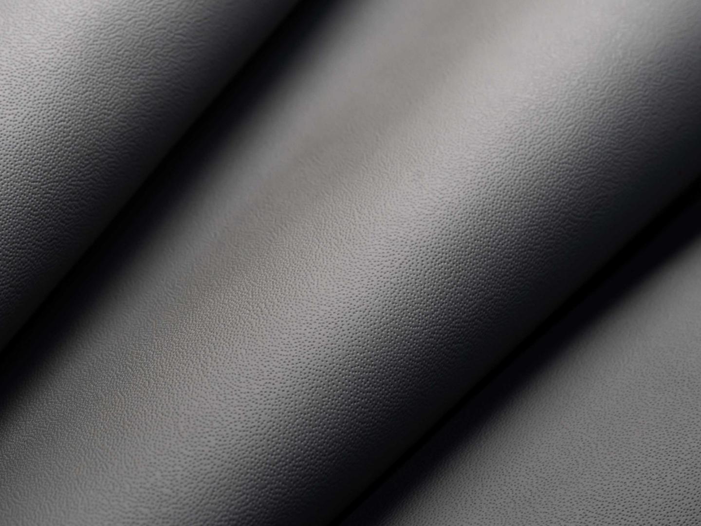 Detailed textured view of dark leather